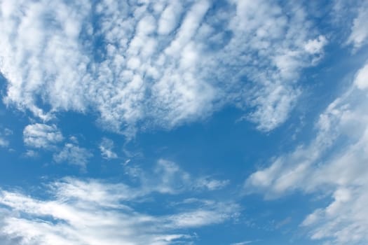 Various light clouds on the background of a blue sky