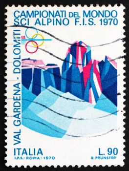ITALY - CIRCA 1970: a stamp printed in the Italy shows Sassolungo and Sella Group, Dolomite Alps, World Alpine Ski Championships, Val Gardena, Bolzano Province, circa 1970
