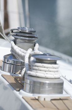 Detail of sailboat with two winches and rope