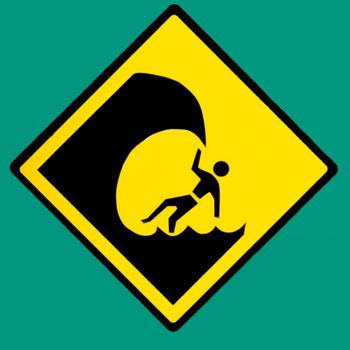 Dangerous surf or tsunami hazard symbol warning sign on wall painted green warning of dangerously high waves breaking on beach posing a risk for surfers and swimmers