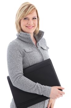 Smiling businesswoman standing with a large black leather folio tucked under her arm isolated on white 