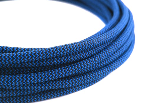 Closeup of blue rope on white background