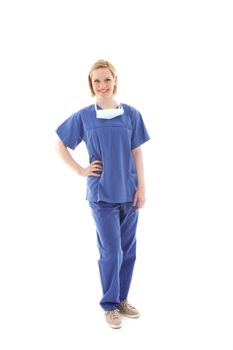 Full length portrait of a friendly young theatre nurse in blue scrubs isolated on white Full length portrait of a friendly young theatre nurse in blue scrubs islated on white 