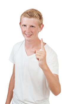 Portrait of a handsome young man pointing finger up against white background