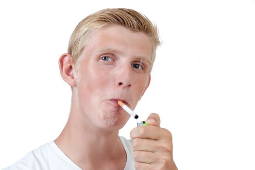 young blond man smoking cigarette with lighter in hand, isolated over white background