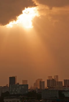 Rays of sunlight bursting through clouds