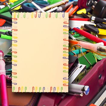 	
illustration of a sheet of A4 paper in a frame of colored paper clips in the background stationery