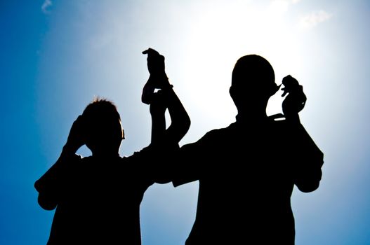 silhouette of boy with medal prize