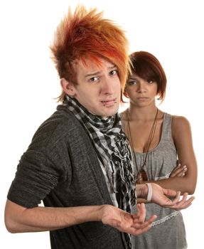 Young man with hunched shoulders and frustrated girlfriend