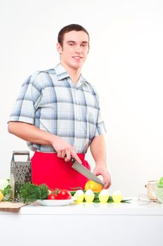 portrait of a man, cut vegetables, make meal