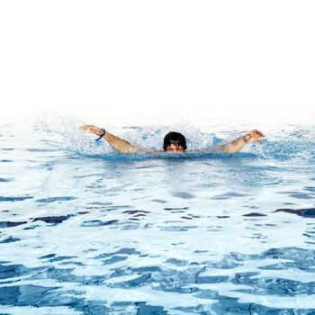 man swims in swimming pool