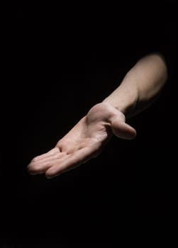 Human Hand on black background