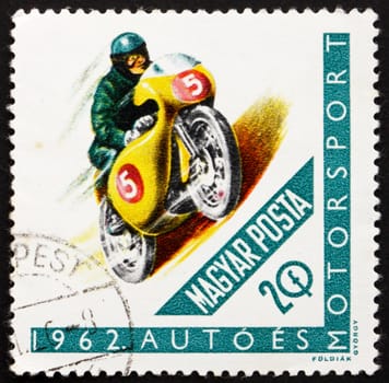 HUNGARY - CIRCA 1962: a stamp printed in the Hungary shows Racing Motorcyclist, circa 1962