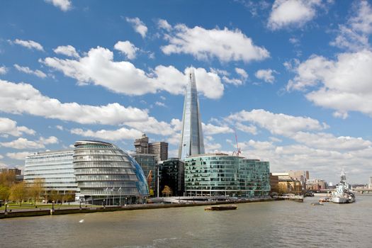 London City Hall Skylines along River Thames against blue sky, England UK