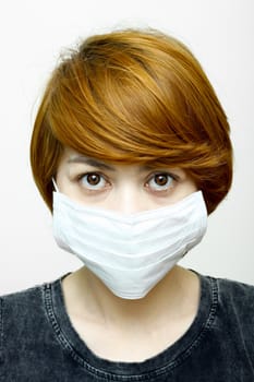 Image of woman wearing protective mask.