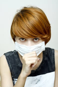 Image of woman wearing protective mask.