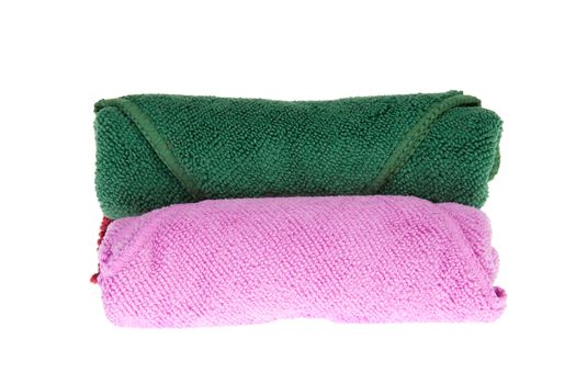 colorful towels rolls on white background