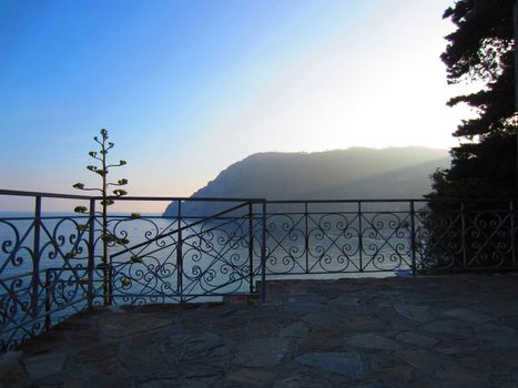Wrought iron fence on Italian coast in Liguria                            