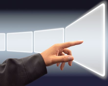 hand pushing a button on a touch screen interface 