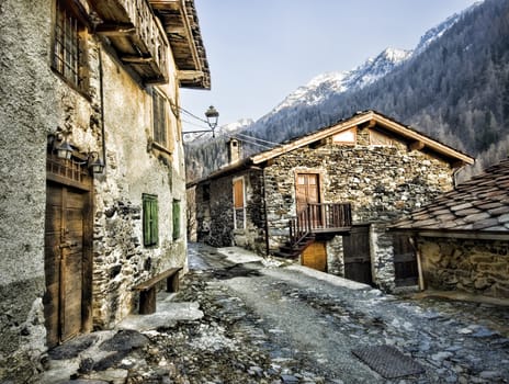 traditional stone houses in Italy Alps