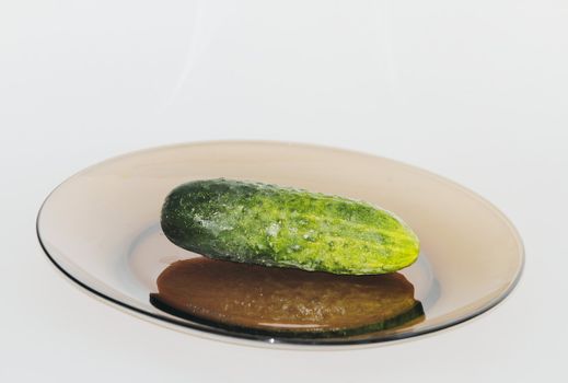 vegetables on a dark plate on a white background