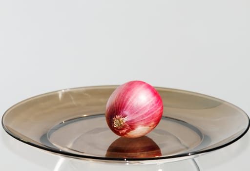 vegetables on a dark plate on a white background