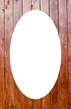 Isolated white oval place for text photograph image in center of frame. Wall of narrow brown painted planks. Wooden architectural background.