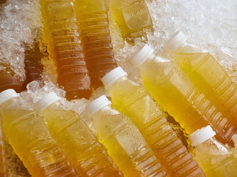 Fresh lemon tea bottles in ice