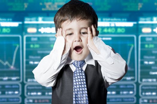 Surprised businessman child in suit with funny face