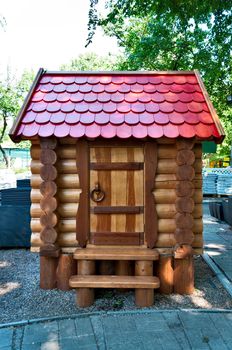 Small children's lodge from a tree.