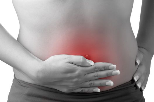 Woman suffering from stomach pain, isolated in white, black and white with a red circle around the painful area