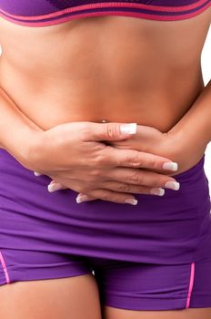 Woman suffering from stomach pain, isolated in white.