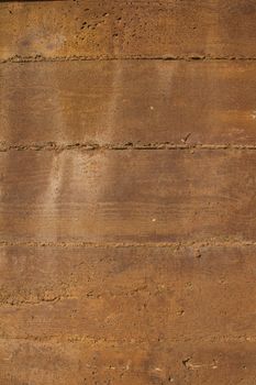 Brown stained cement wall