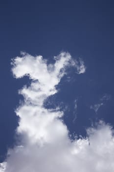 Dramatic Cloudy Sky with a deep blue background.