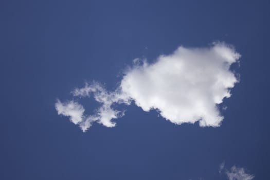 Dramatic Cloudy Sky with a deep blue background.