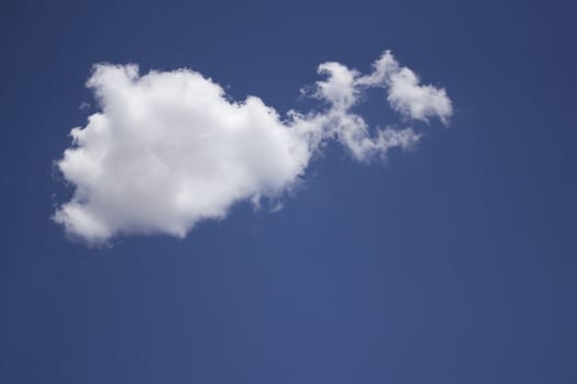 Dramatic Cloudy Sky with a deep blue background.