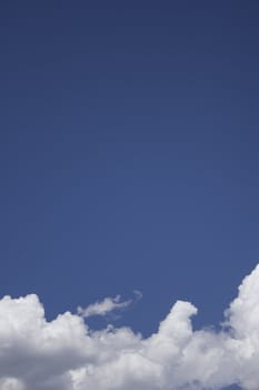 Dramatic Cloudy Sky with a deep blue background.