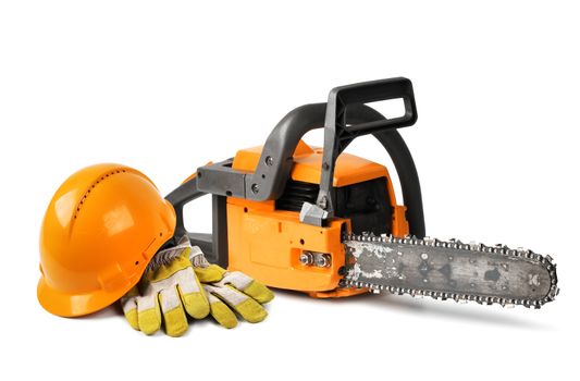 Chain saw and orange hard hat isolated, safety concept