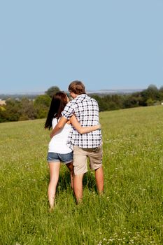 young love couple smiling outdoor in summer having fun