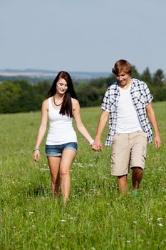 young love couple smiling outdoor in summer having fun