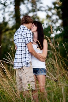 young love couple smiling outdoor in summer having fun