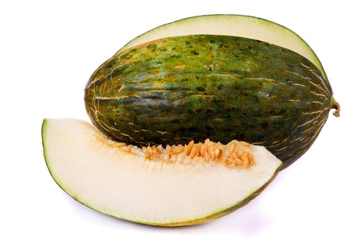 Close up view of a sliced green rock melon isolated on a white background.