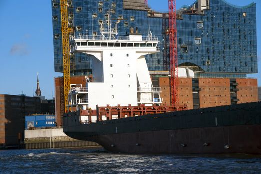 Ship and the Elbe Philharmonic Hall (Elbphilharmonie) in Hamburg