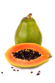 Close up view of a tropical papaya fruit isolated on a white background.