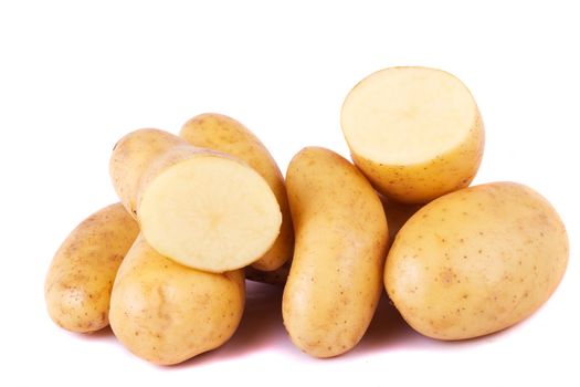 Close up view of some potatoes isolated on a white background.