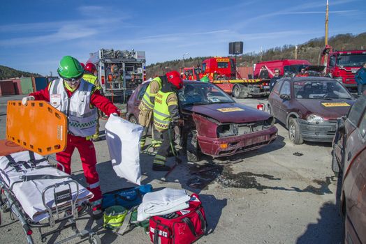 Heavy and powerful hydraulic equipment required to cut and break up a damaged car