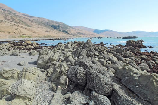 A rocky beach and blue sky off of Mattole Road on the Lost Coast of California