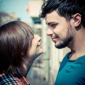 couple embracing on balcony