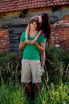 young couple in love smiling and having fun in summer outdoor 