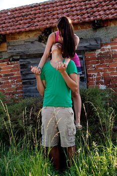 young couple in love smiling and having fun in summer outdoor 